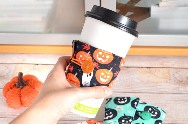 Retro Pumpkin Ghost Coffee Sleeve