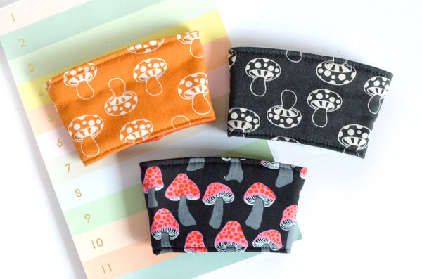 Black & Orange Mushroom Coffee Sleeve