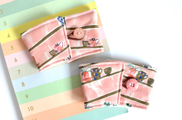 Pink Mug Shelf Coffee Sleeve