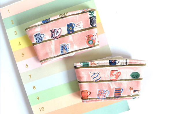 Pink Mug Shelf Coffee Sleeve