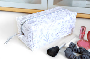White Floral Laminated Toiletry Bag